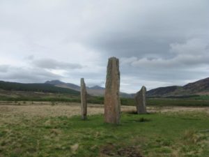 Image showing the three upright stones of an ancient site.